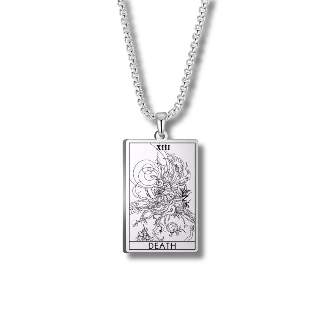 Silver pendant with 'Death' tarot card design on a white background