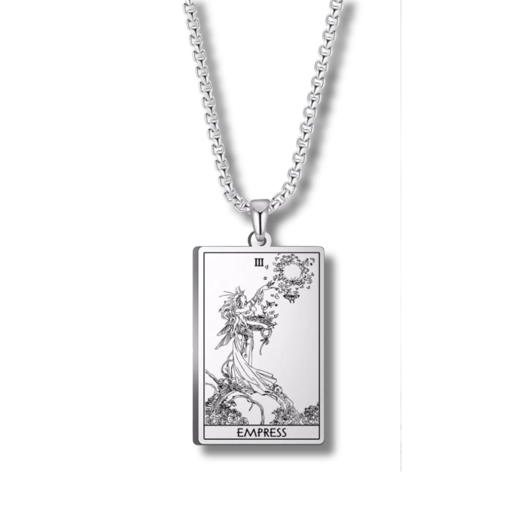 Silver necklace with 'Empress' tarot card pendant on a white background