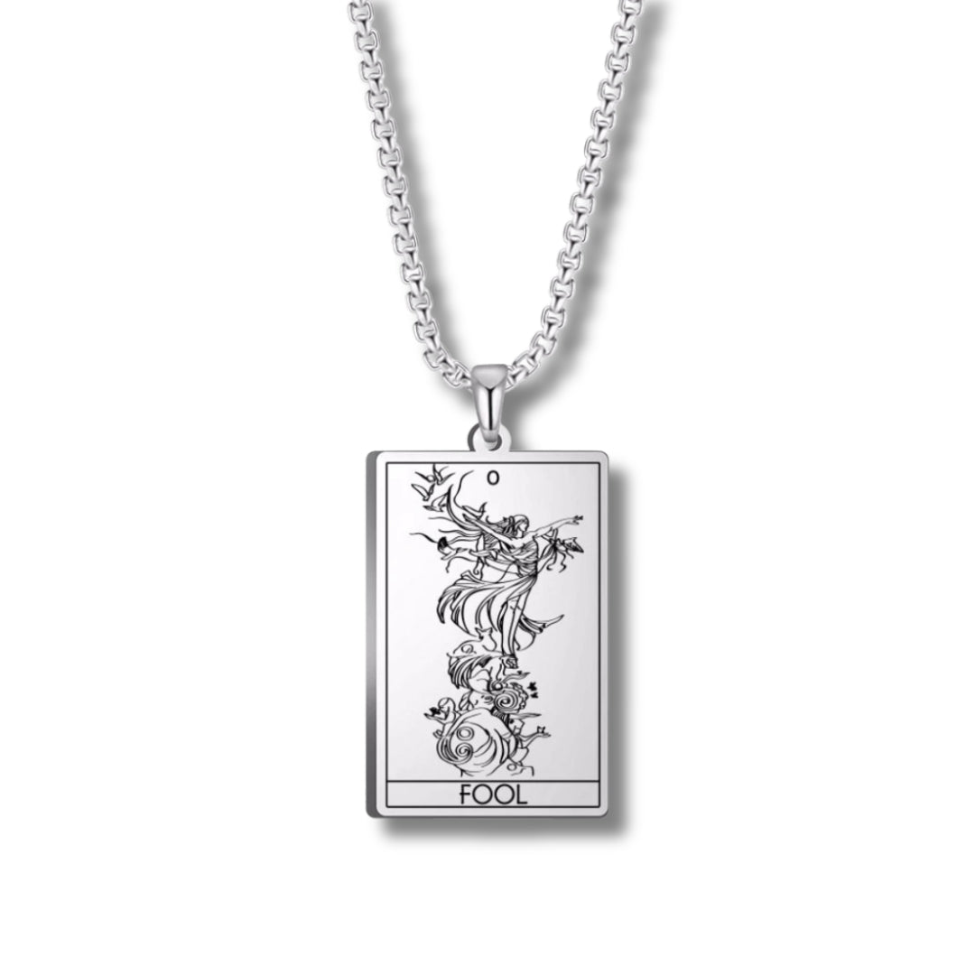 Silver tarot card pendant necklace on a white background