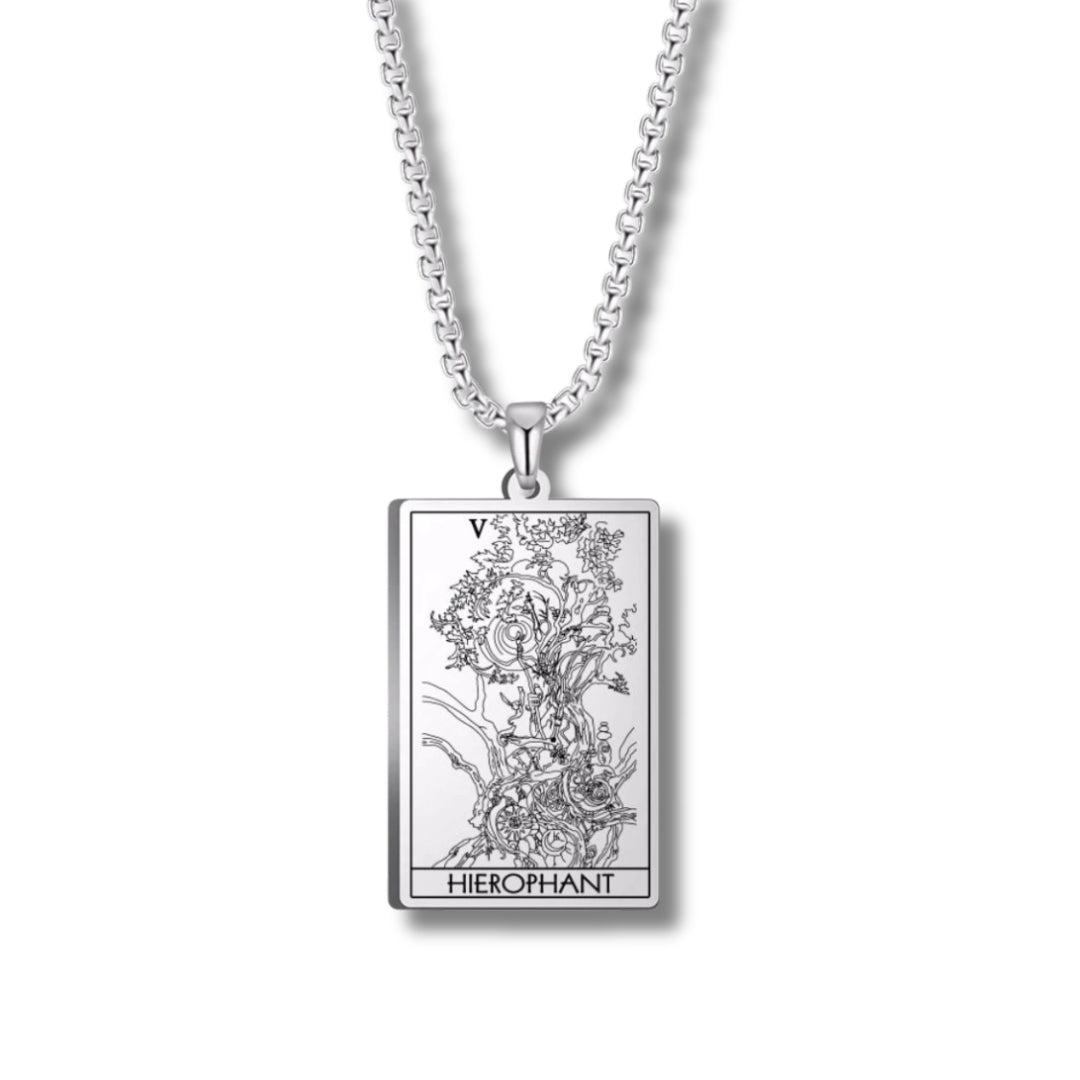 Silver pendant with tarot card design on a white background