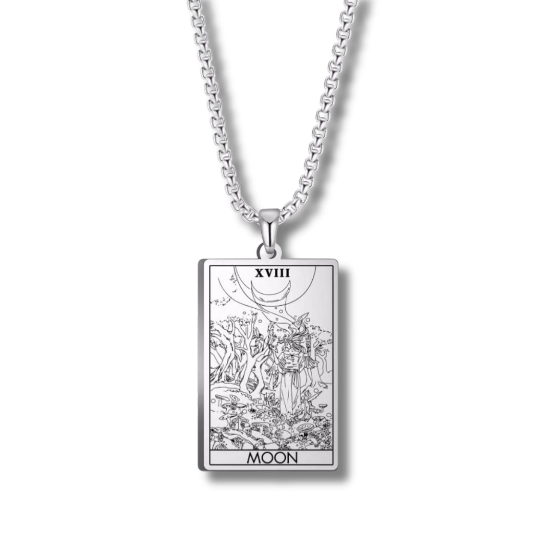 Silver pendant with 'Moon' tarot card design on a white background