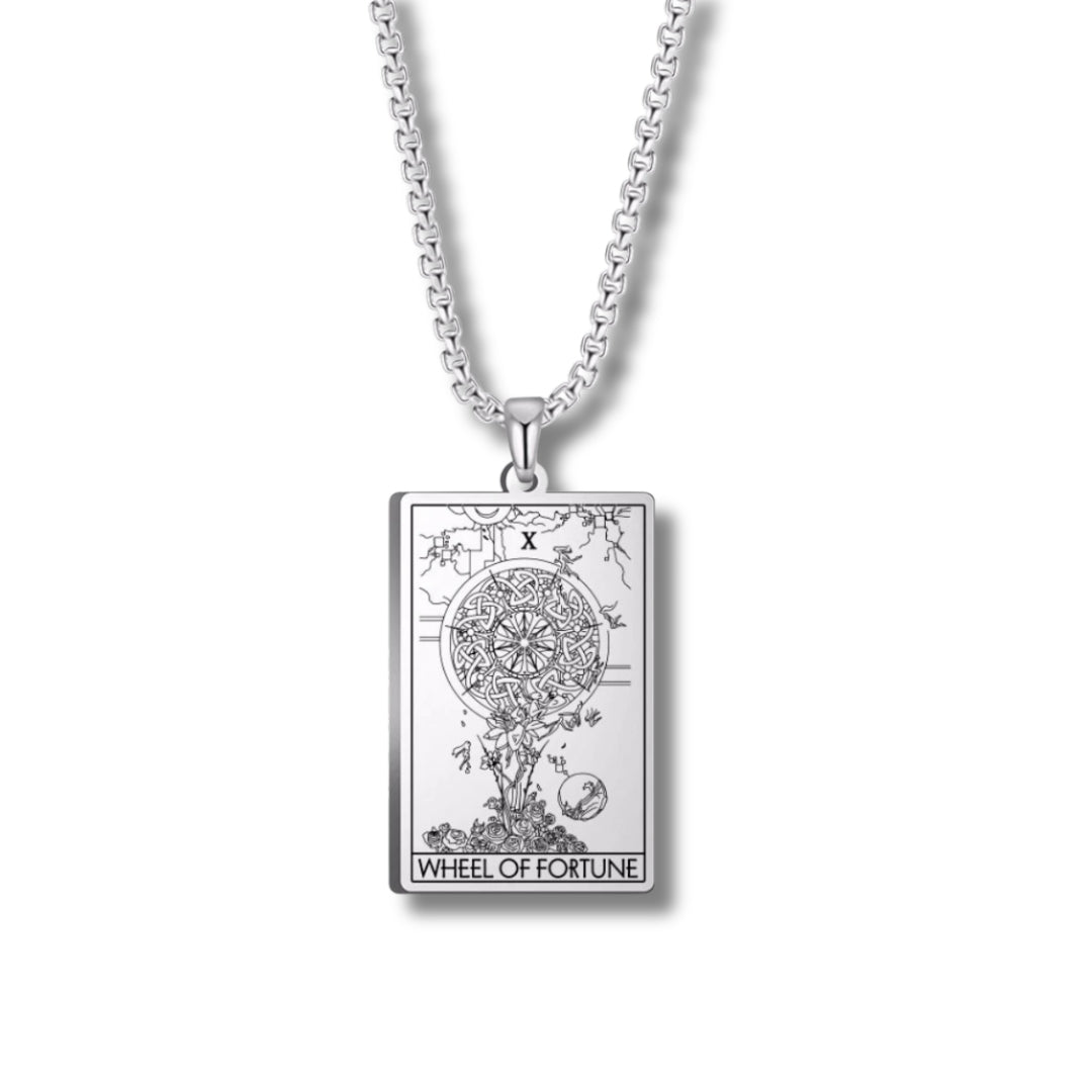 Silver necklace with 'Wheel of Fortune' pendant on a white background